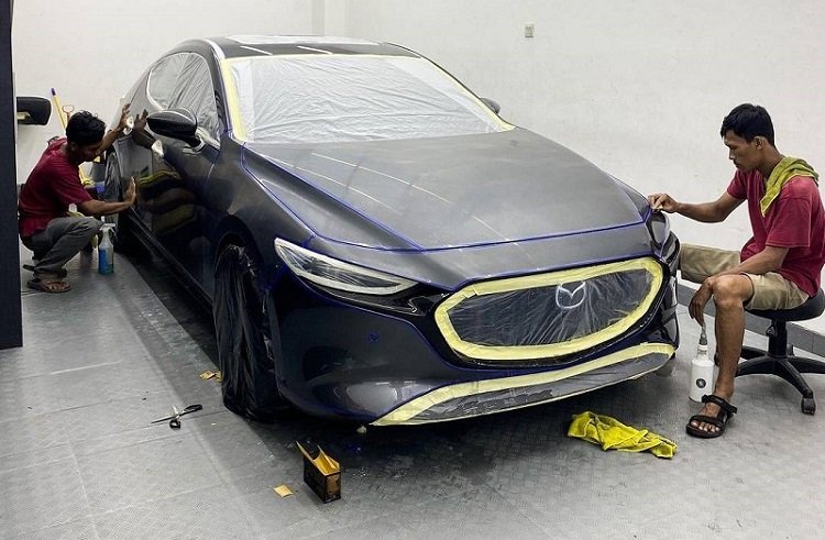 Workshop imagery representing careful surface preparation.
